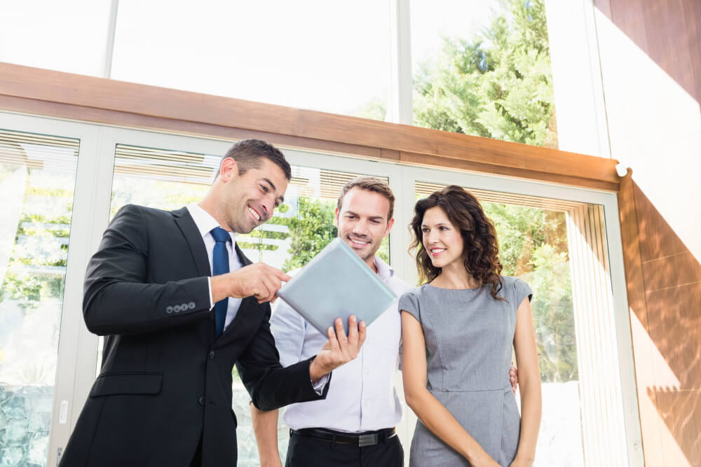 realtor showing tablet
